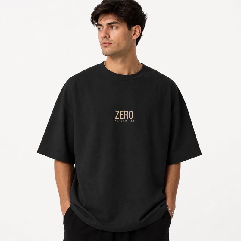 A person shown from the FRONT wearing an oversized black T-shirt with a large graphic print of Johannes van der Meeren's painting 'Girl with a Pearl Earring' and the word 'TIMELESS' in gold lettering.